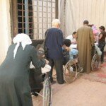 Line-of-People-waiting-for-their-wheelchair-customization-3